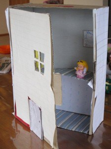 doll's house made from a cardboard box