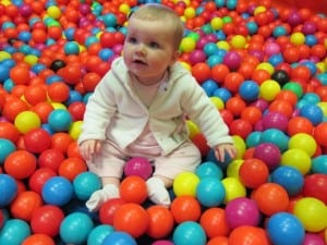 Baby in ball pit