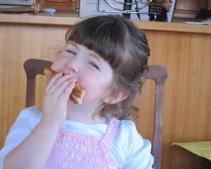 girl eating toast