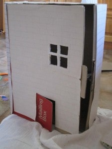 doll's house made from a cardboard box
