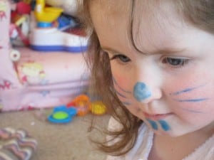 child with rabbit face painting
